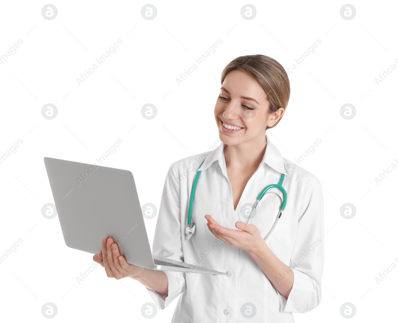 Photo of Female doctor using video chat on laptop against white background