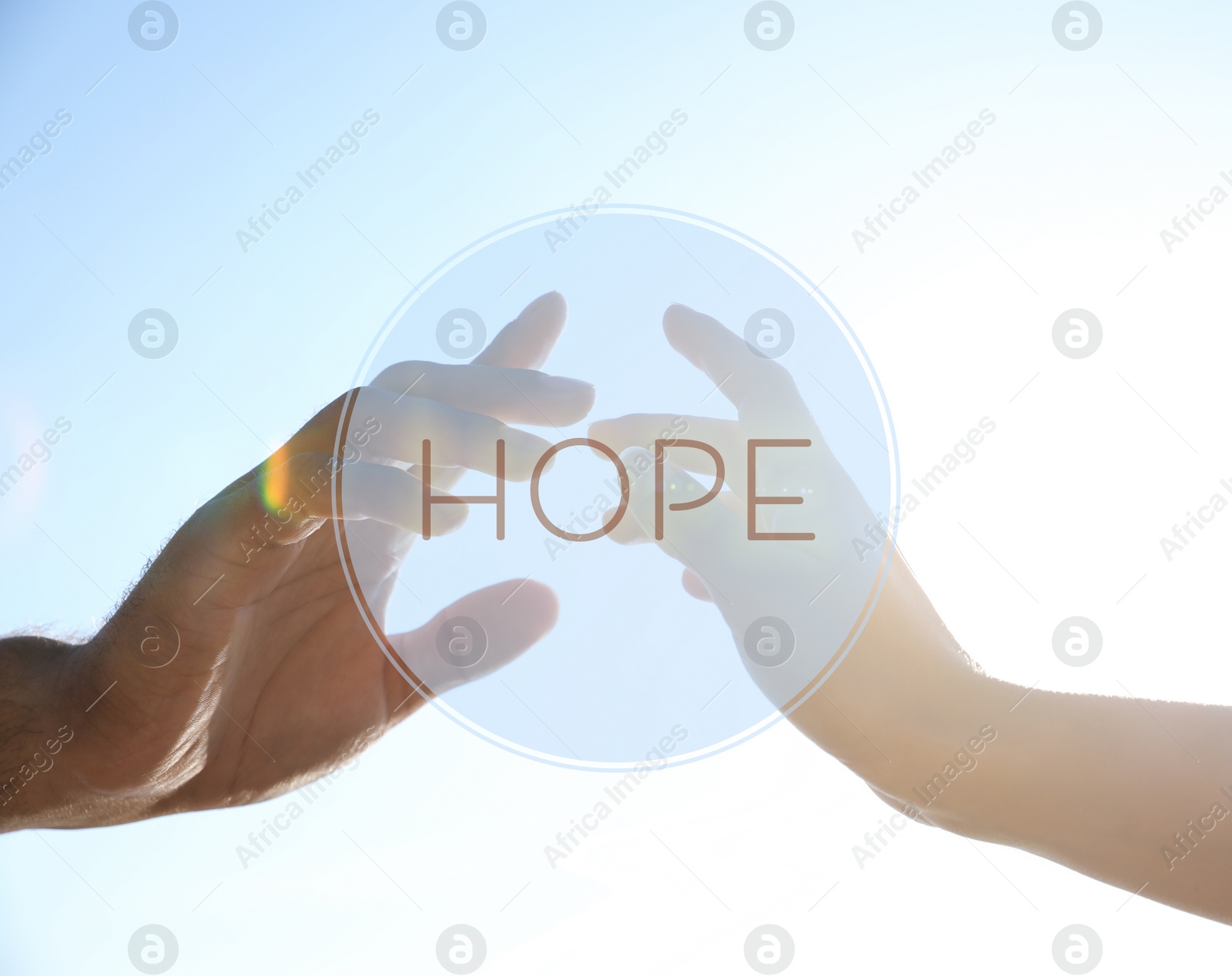 Image of Concept of hope. Man and woman reaching hands to each other, closeup