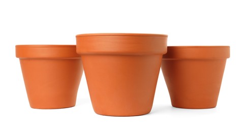 Photo of Empty clay flower pots isolated on white