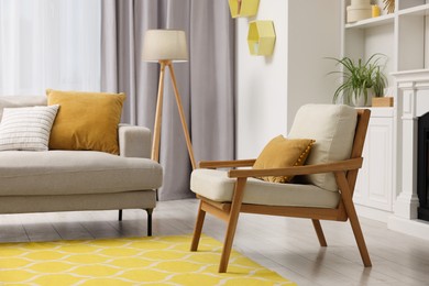 Spring atmosphere. Comfy sofa, lamp and armchair in room