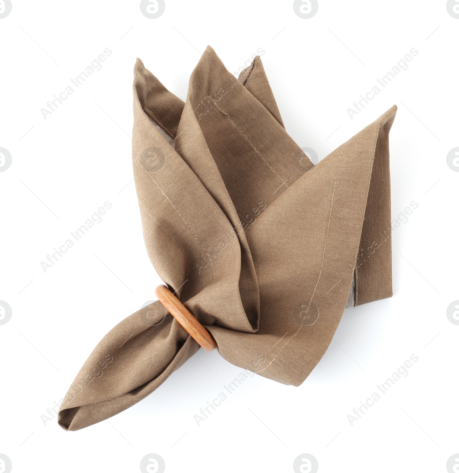 Photo of Fabric napkin with decorative ring for table setting on white background