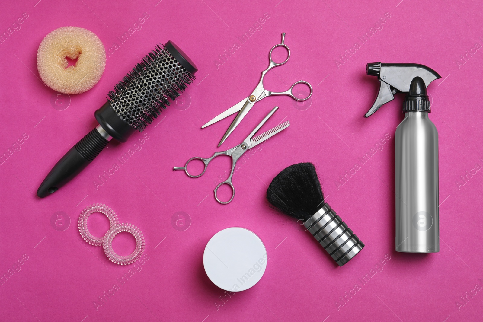 Photo of Professional hairdresser set on color background