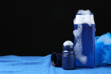 Photo of Men's personal hygiene products on blue soft towel