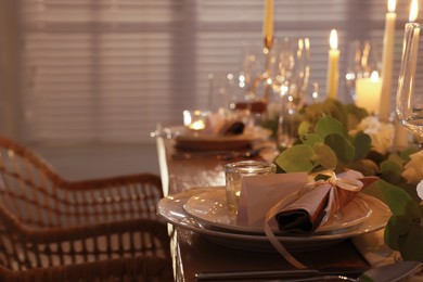 Festive table setting with beautiful tableware and decor indoors