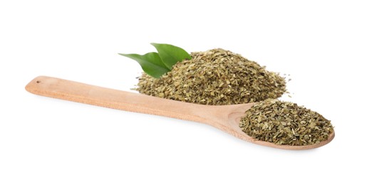 Photo of Pile of aromatic mate tea and spoon on white background