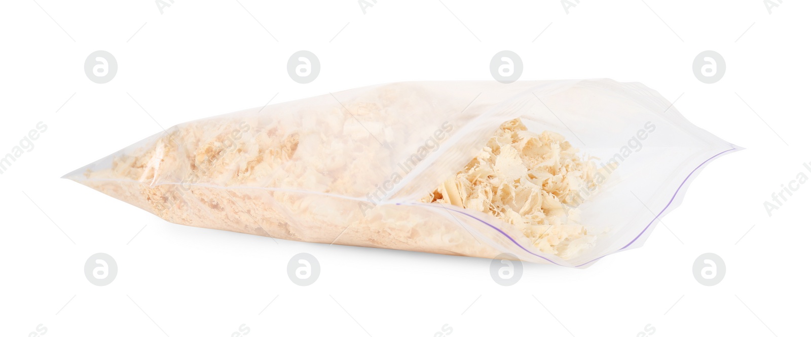 Photo of Natural sawdust in zip bag isolated on white