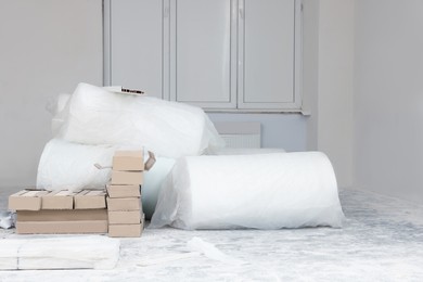 Photo of Building materials in room prepared for renovation