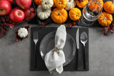 Photo of Happy Thanksgiving day. Beautiful table setting with autumn decor, flat lay