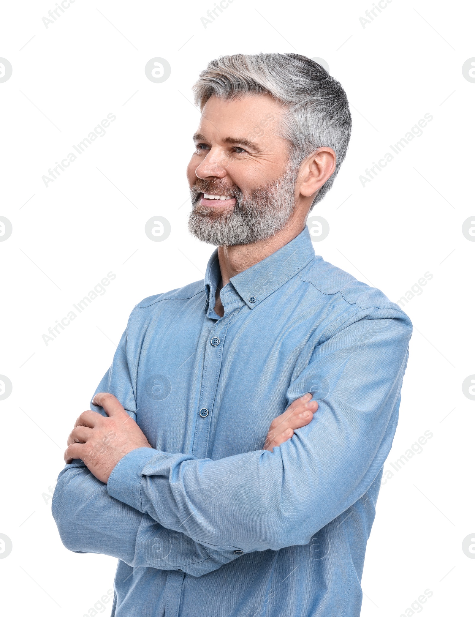 Photo of Mature businessman in stylish clothes posing on white background