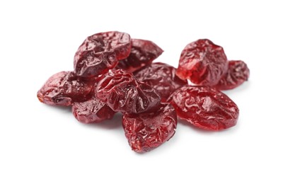 Photo of Many tasty dried cranberries isolated on white