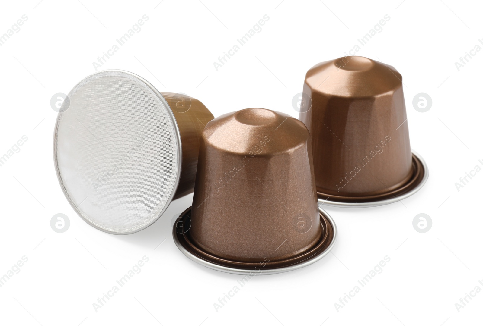 Photo of Three plastic coffee capsules isolated on white