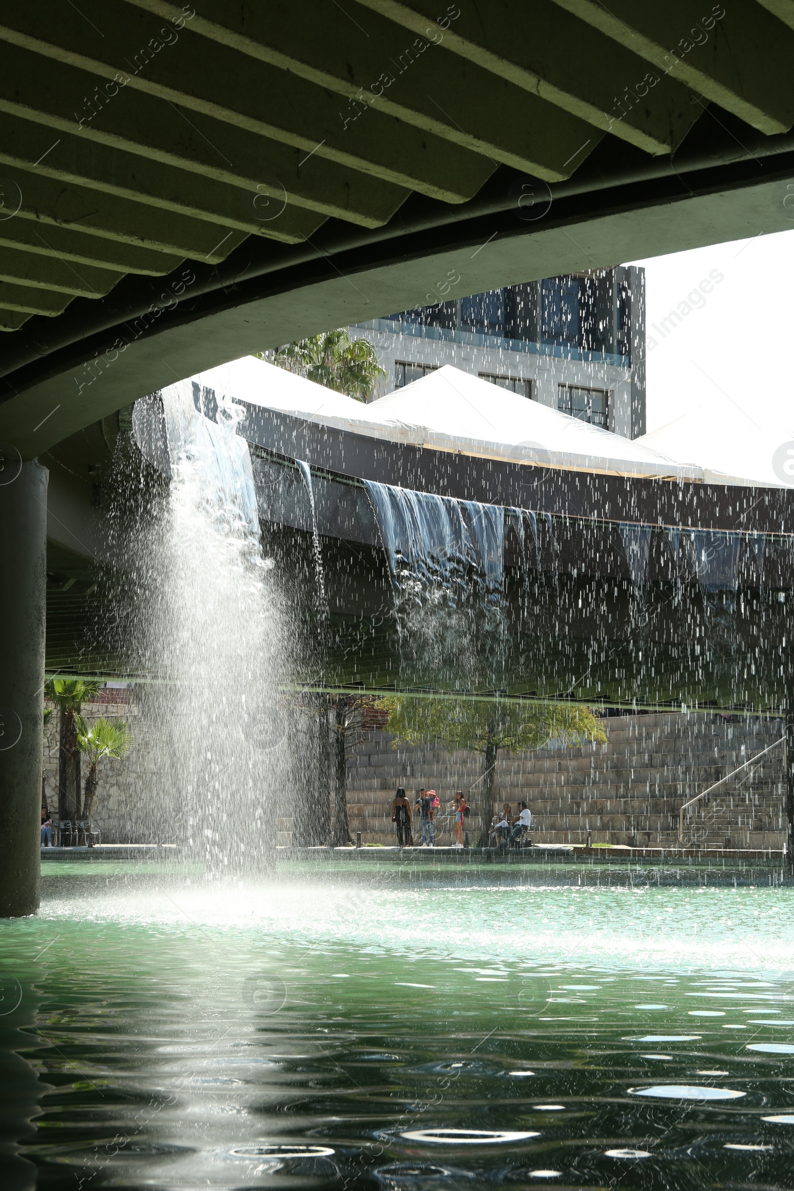 Photo of Monterrey, Mexico - September 11, 2022. Beautiful view of canal with fountain in Parque Fundidora