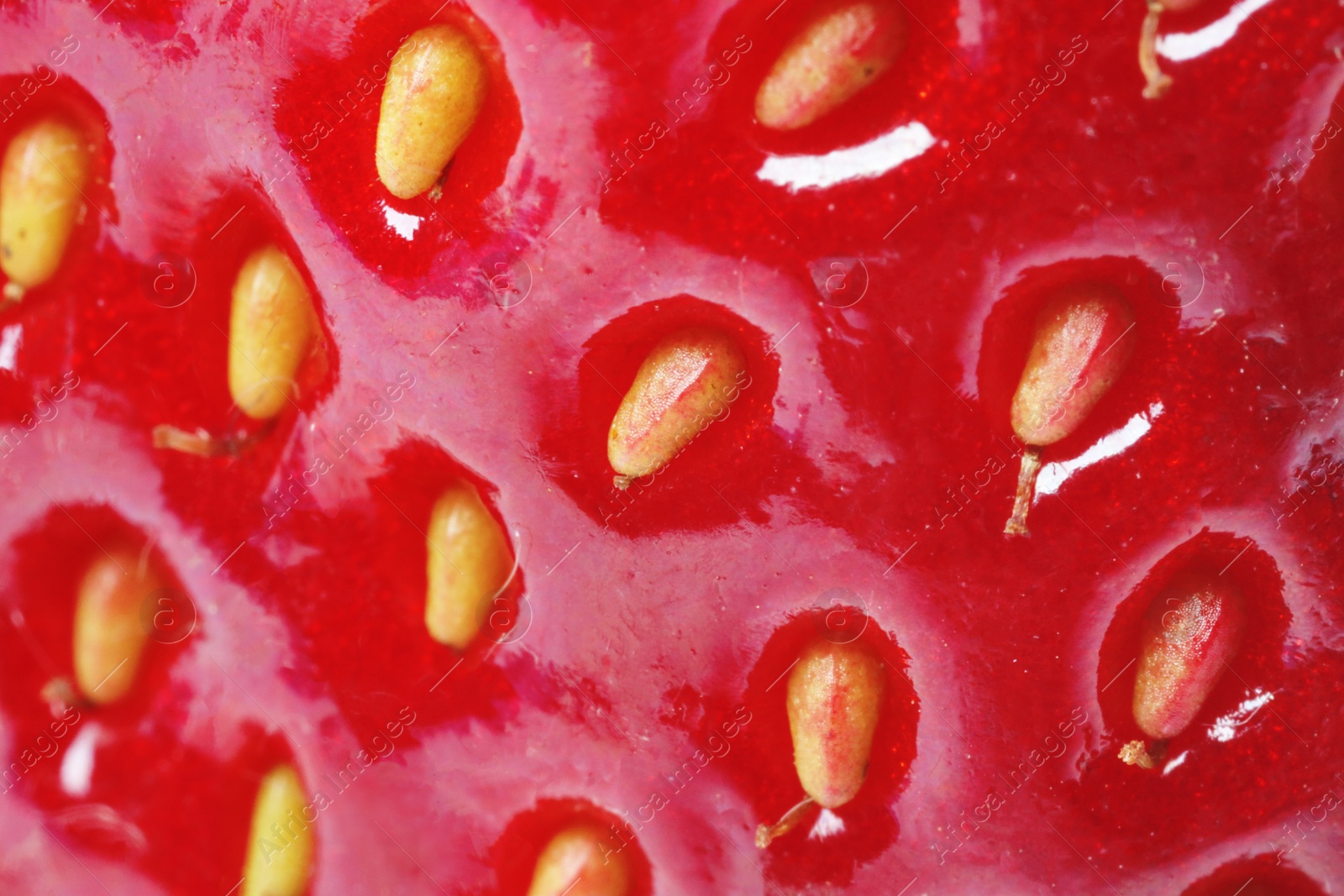 Photo of Texture of ripe strawberry as background, macro view. Fresh berry