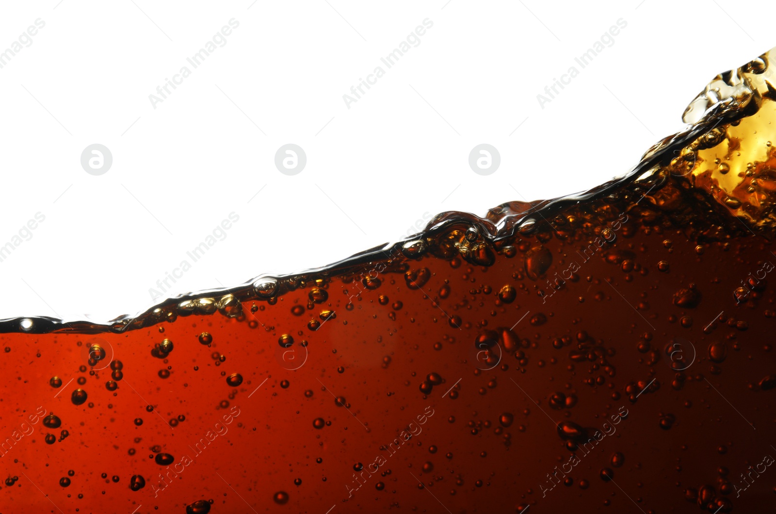 Photo of Closeup view of tasty refreshing cola on white background