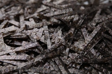 Chopped crispy nori sheets as background, closeup