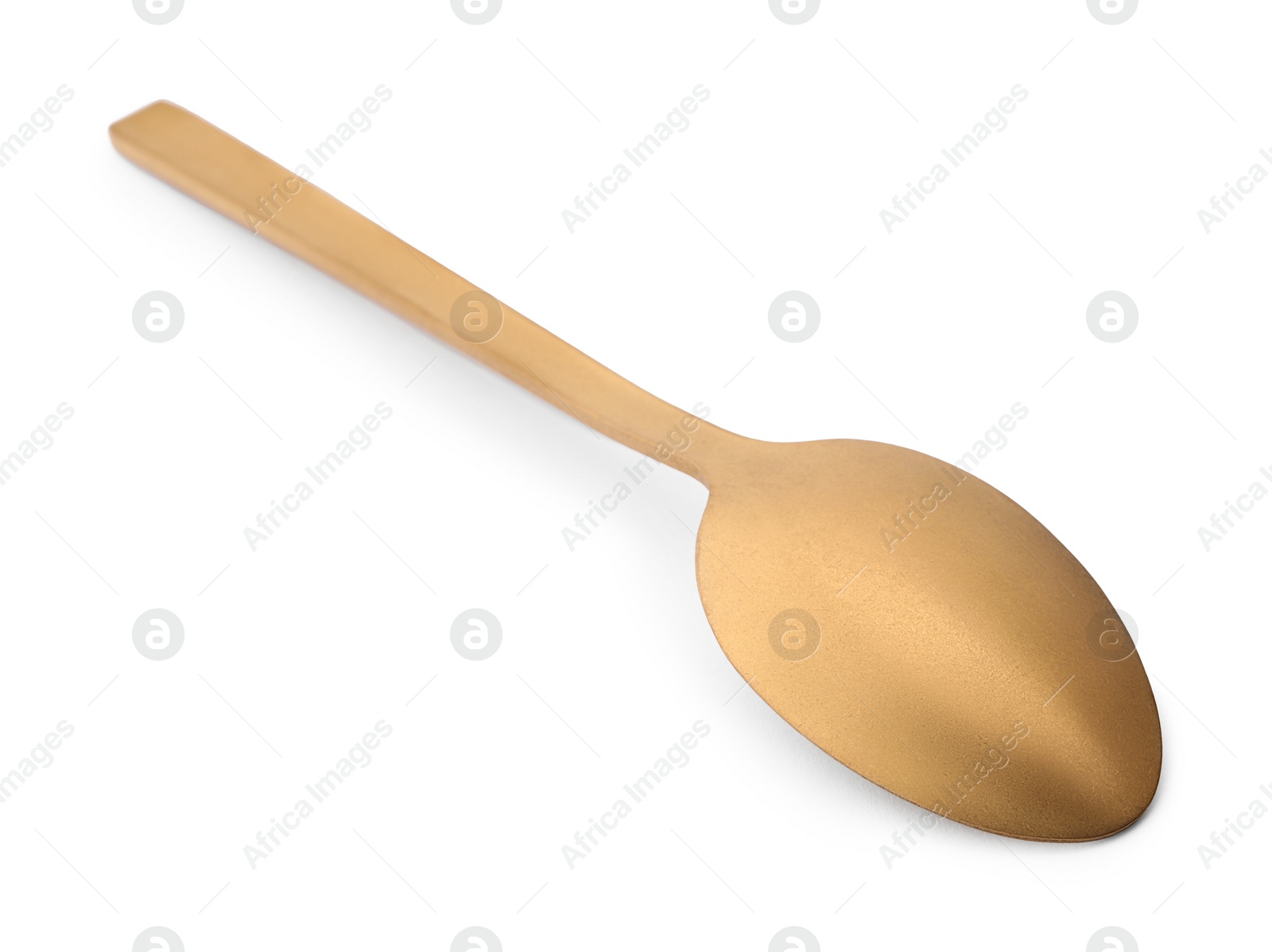 Photo of One new golden spoon isolated on white