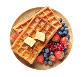 Photo of Plate of delicious Belgian waffles with honey, berries and butter isolated on white, top view