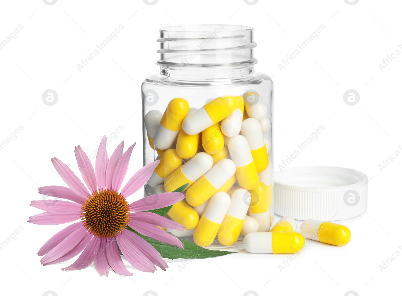 Image of Bottle with vitamin pills and beautiful echinacea flower on white background