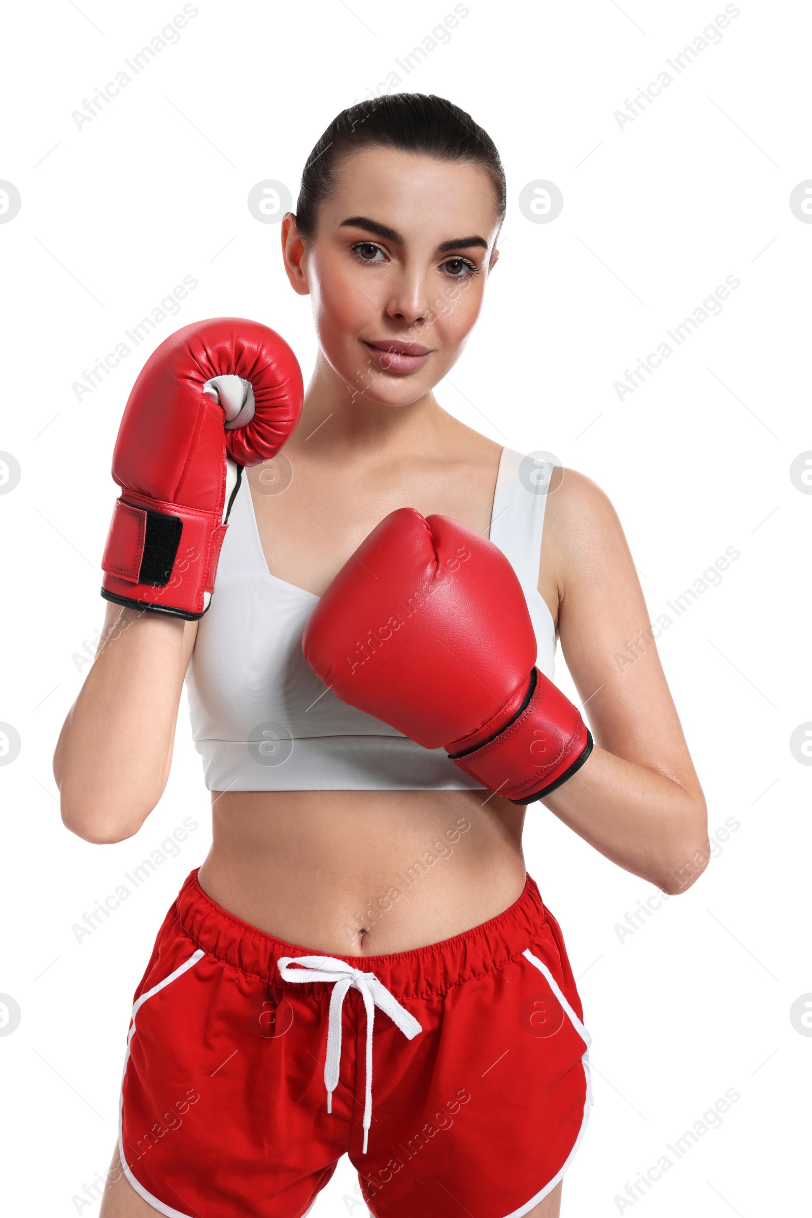 Photo of Beautiful woman in boxing gloves on white background