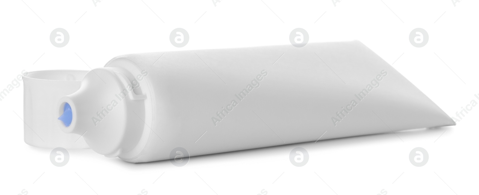 Photo of Blank tube of toothpaste isolated on white