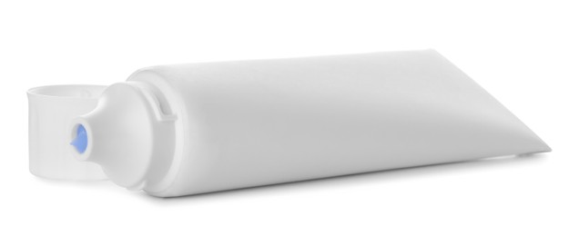 Photo of Blank tube of toothpaste isolated on white