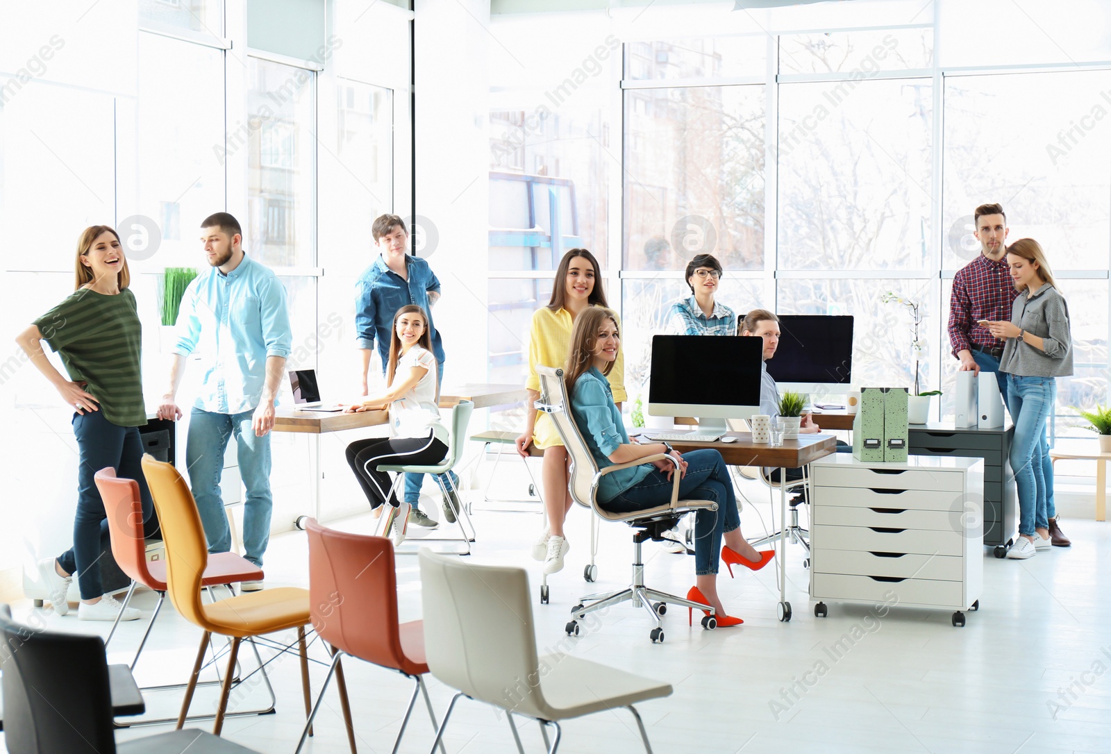 Photo of Young people having business training in office