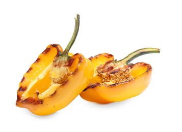 Photo of Halves of grilled yellow bell pepper isolated on white