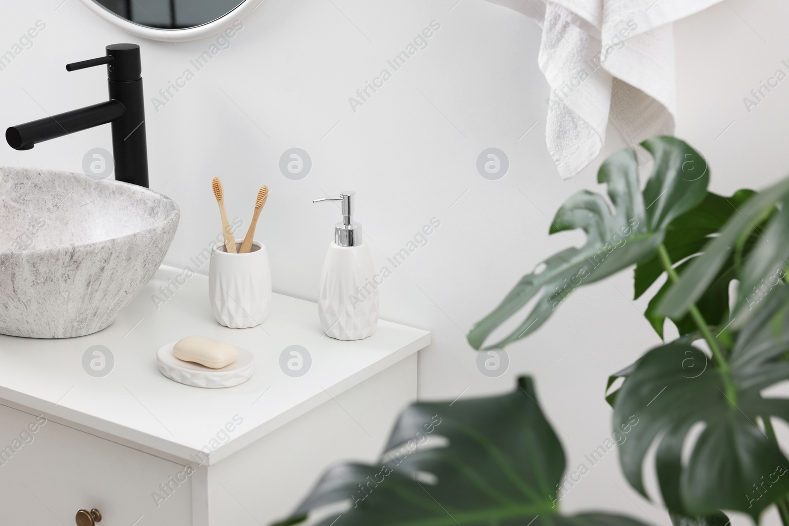 Photo of Different bath accessories and personal care products in bathroom