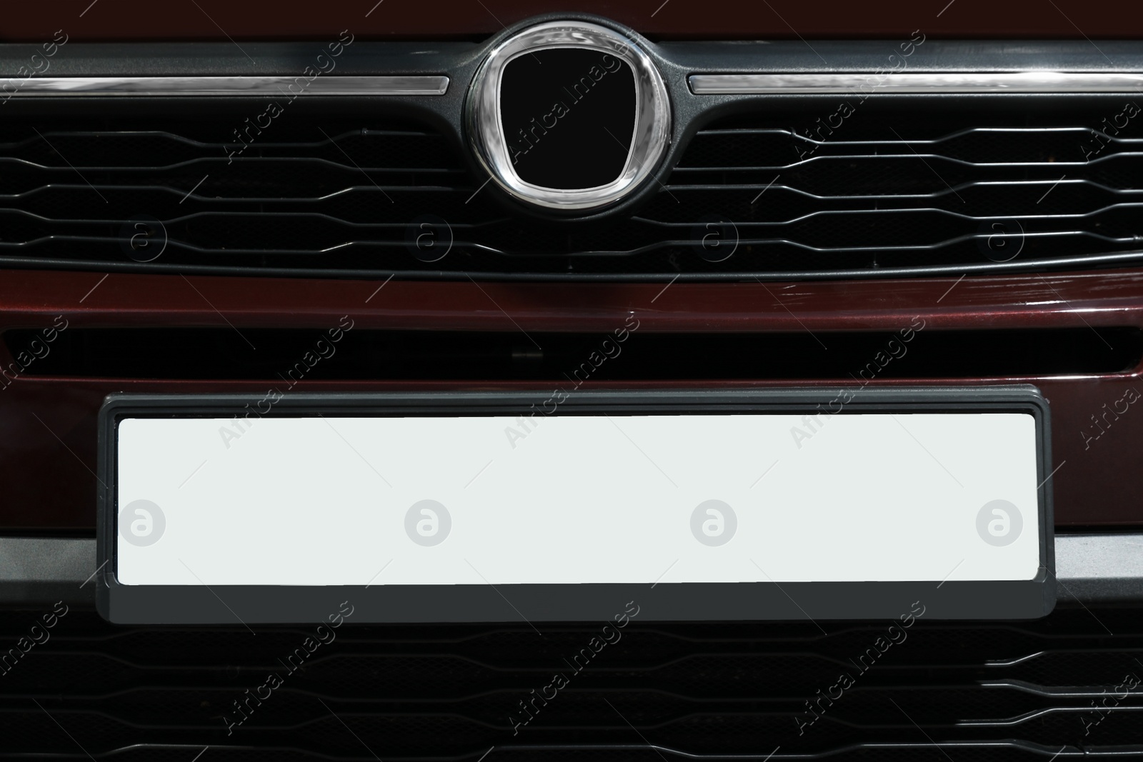 Photo of Car with vehicle registration plate, closeup view