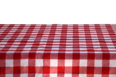 Table with checkered picnic cloth isolated on white