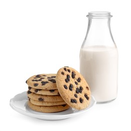 Photo of Delicious chocolate chip cookies and glass bottle with milk isolated on white