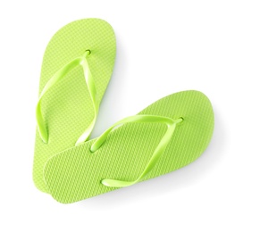 Photo of Bright flip flops on white background. Beach object