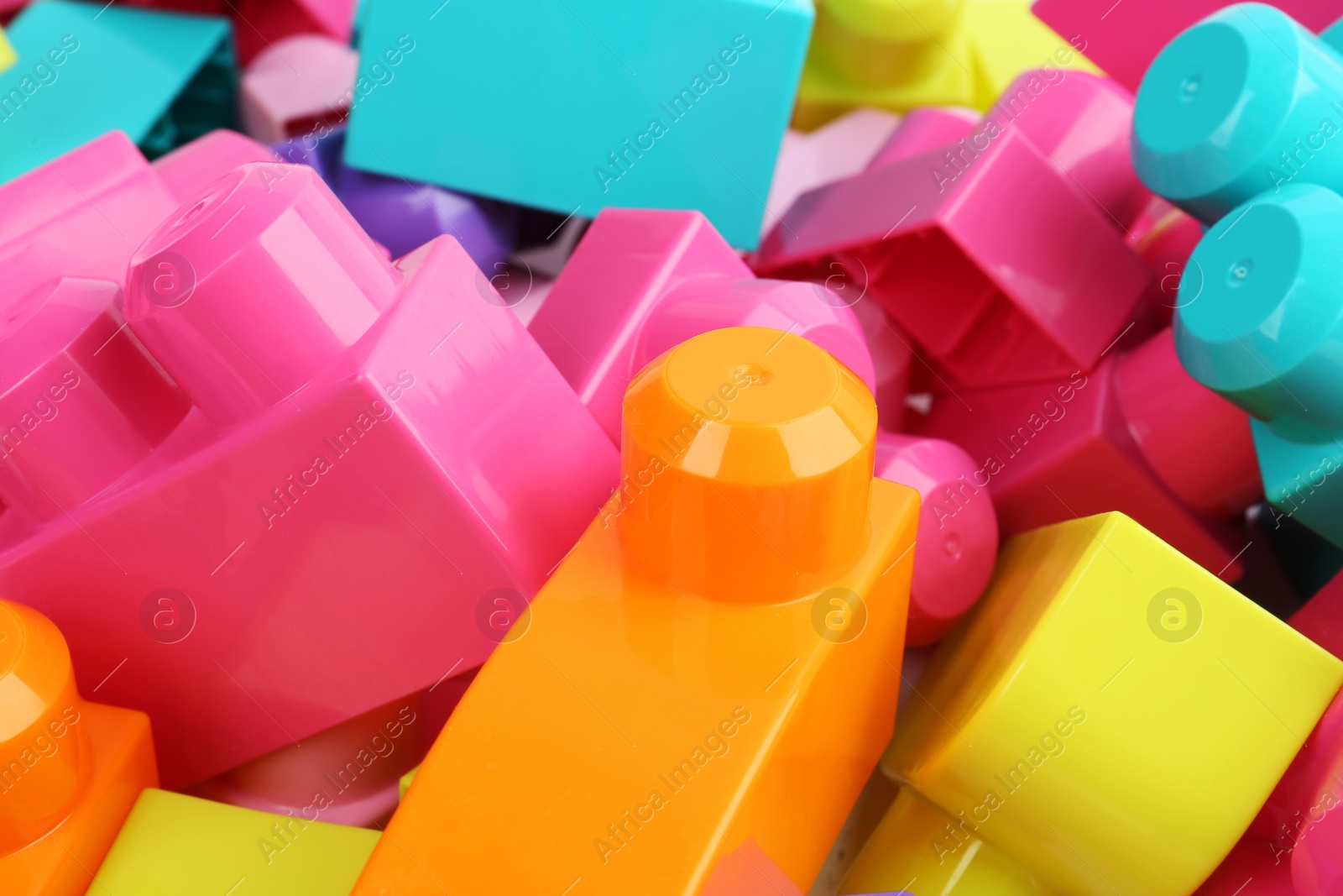 Photo of Colorful blocks as background, closeup. Children's toys