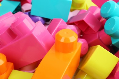 Photo of Colorful blocks as background, closeup. Children's toys