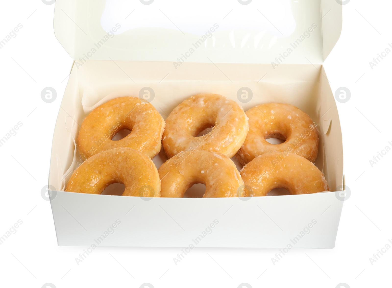 Photo of Delicious donuts in box isolated on white