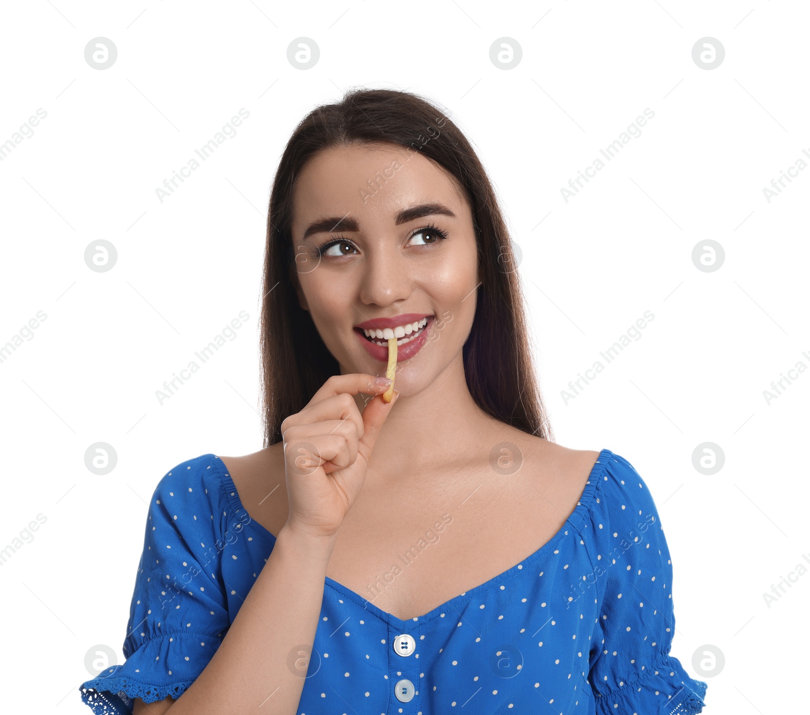 Photo of Beautiful young woman eating French fries on white background