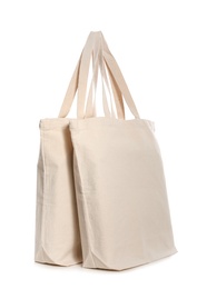 Photo of Eco bags on white background. Mock up for design