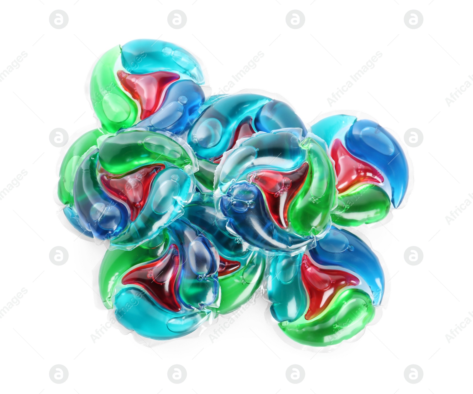 Photo of Heap of laundry capsules on white background, top view