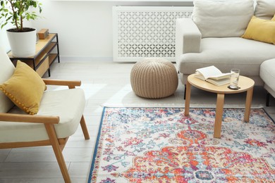 Photo of Stylish living room with beautiful carpet and furniture. Interior design