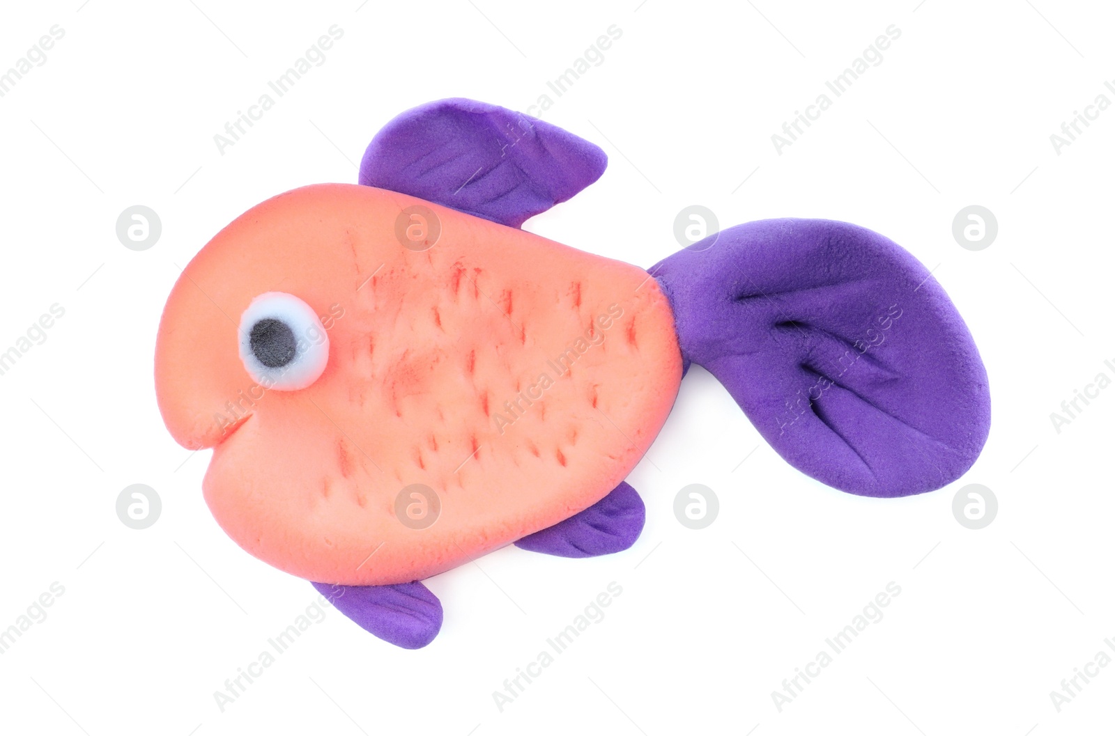 Photo of Colorful fish made from play dough isolated on white, top view