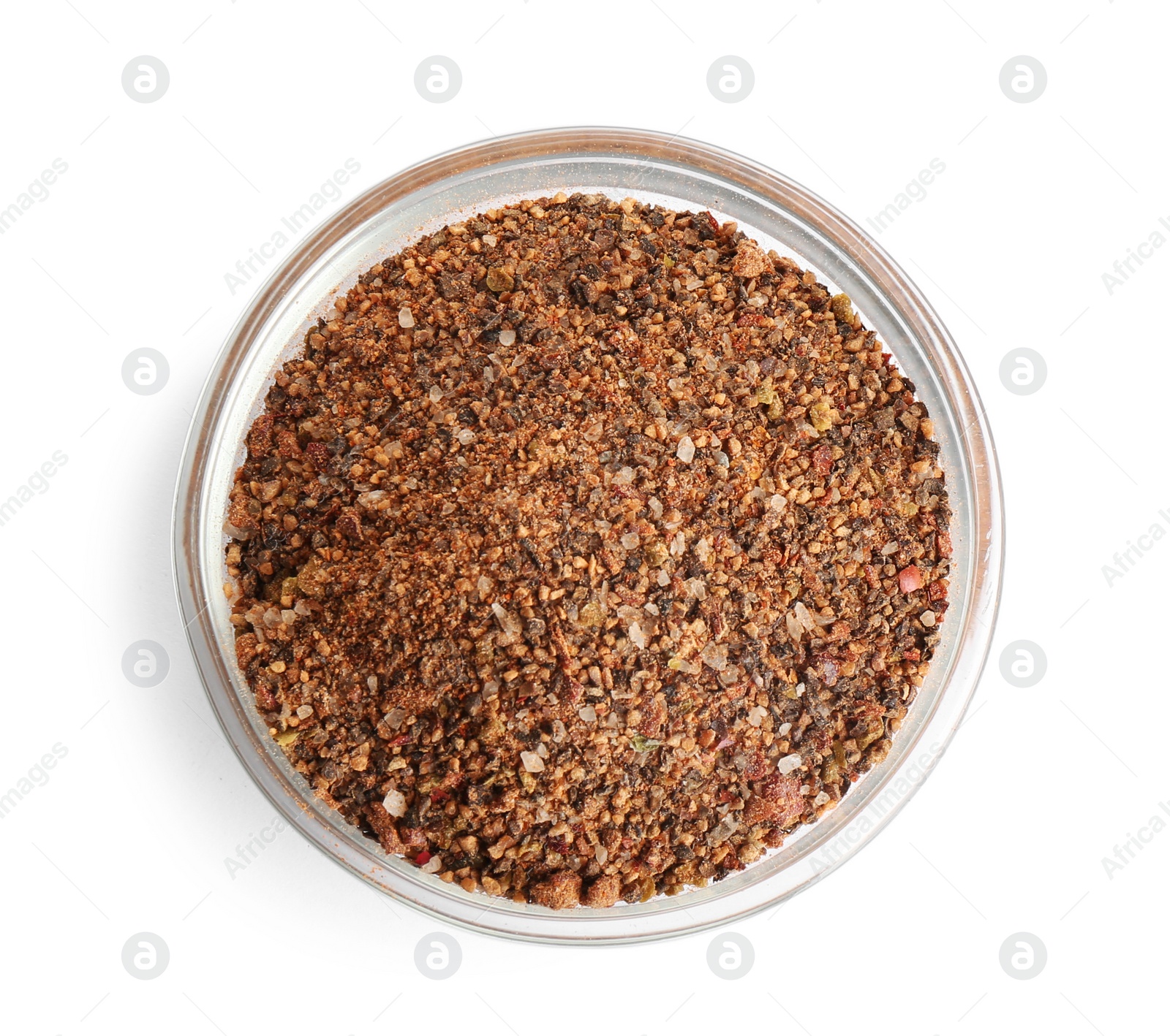 Photo of Bowl of ground pepper isolated on white, top view