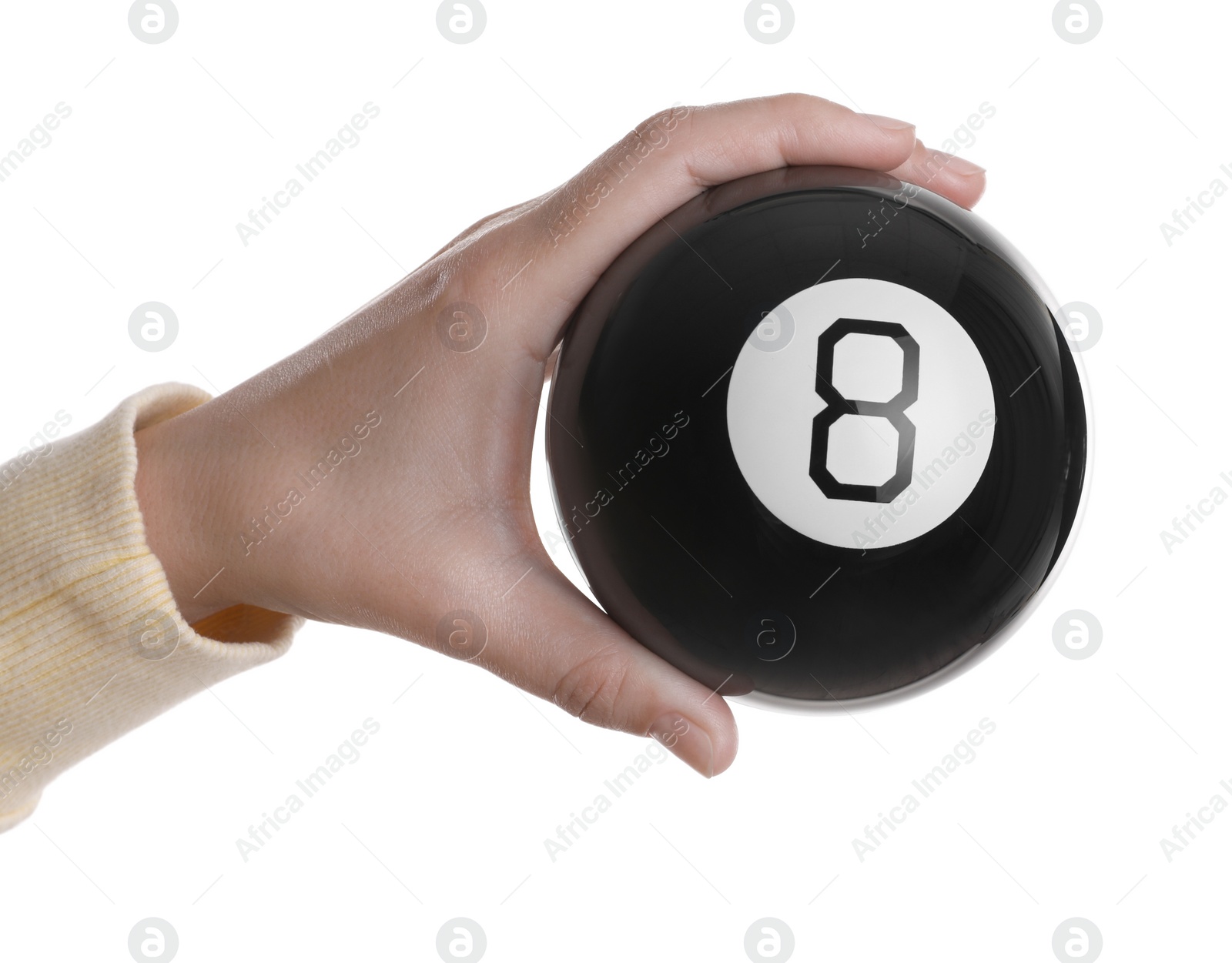 Photo of Woman holding magic eight ball on white background, closeup