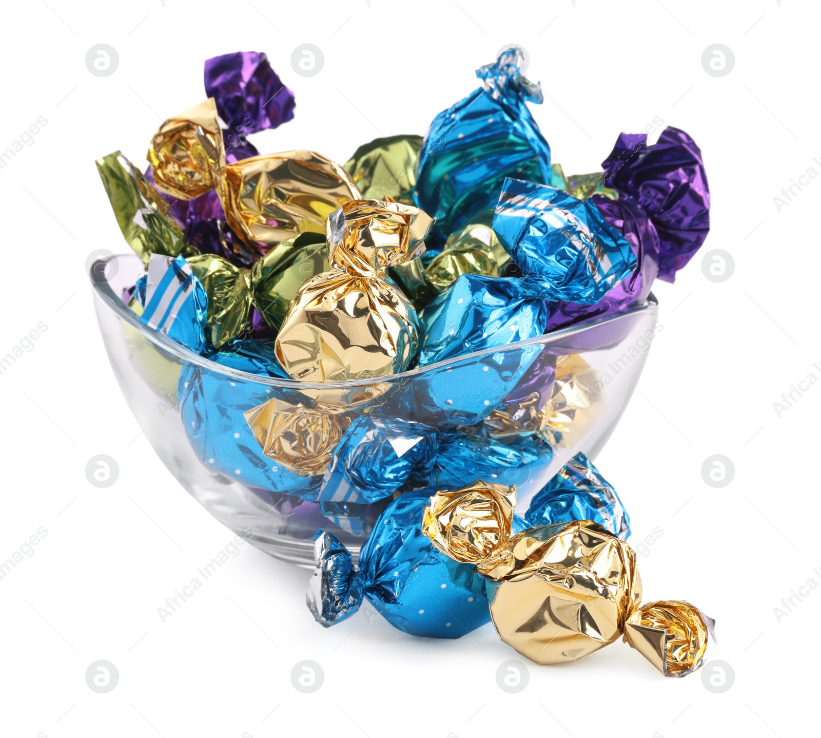 Photo of Bowl with candies in colorful wrappers isolated on white