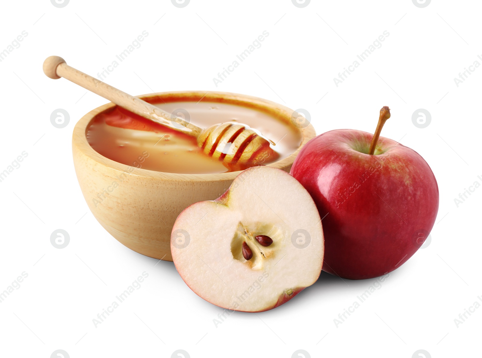 Image of Honey in bowl and apples isolated on white