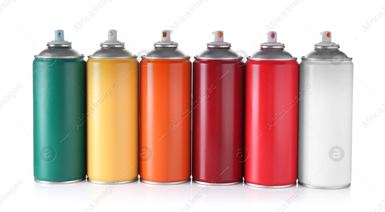 Photo of Many spray paint cans isolated on white