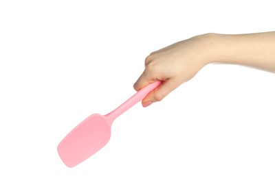 Photo of Woman with pink spatula on white background, closeup