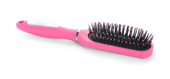 Photo of New modern hair brush isolated on white