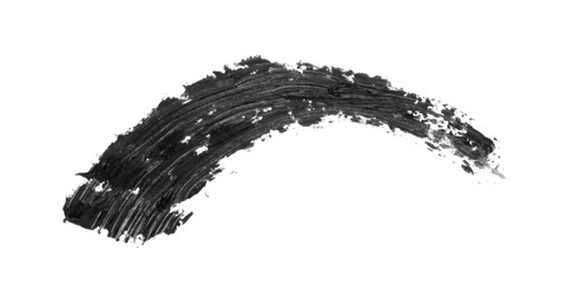 Photo of Smear of black mascara for eyelashes on white background