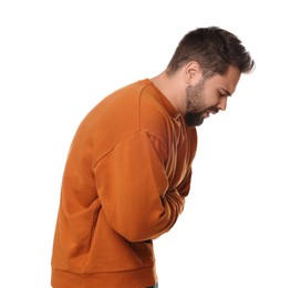 Photo of Young man suffering from stomach pain on white background
