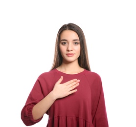 Photo of Woman showing PLEASE gesture in sign language on white background